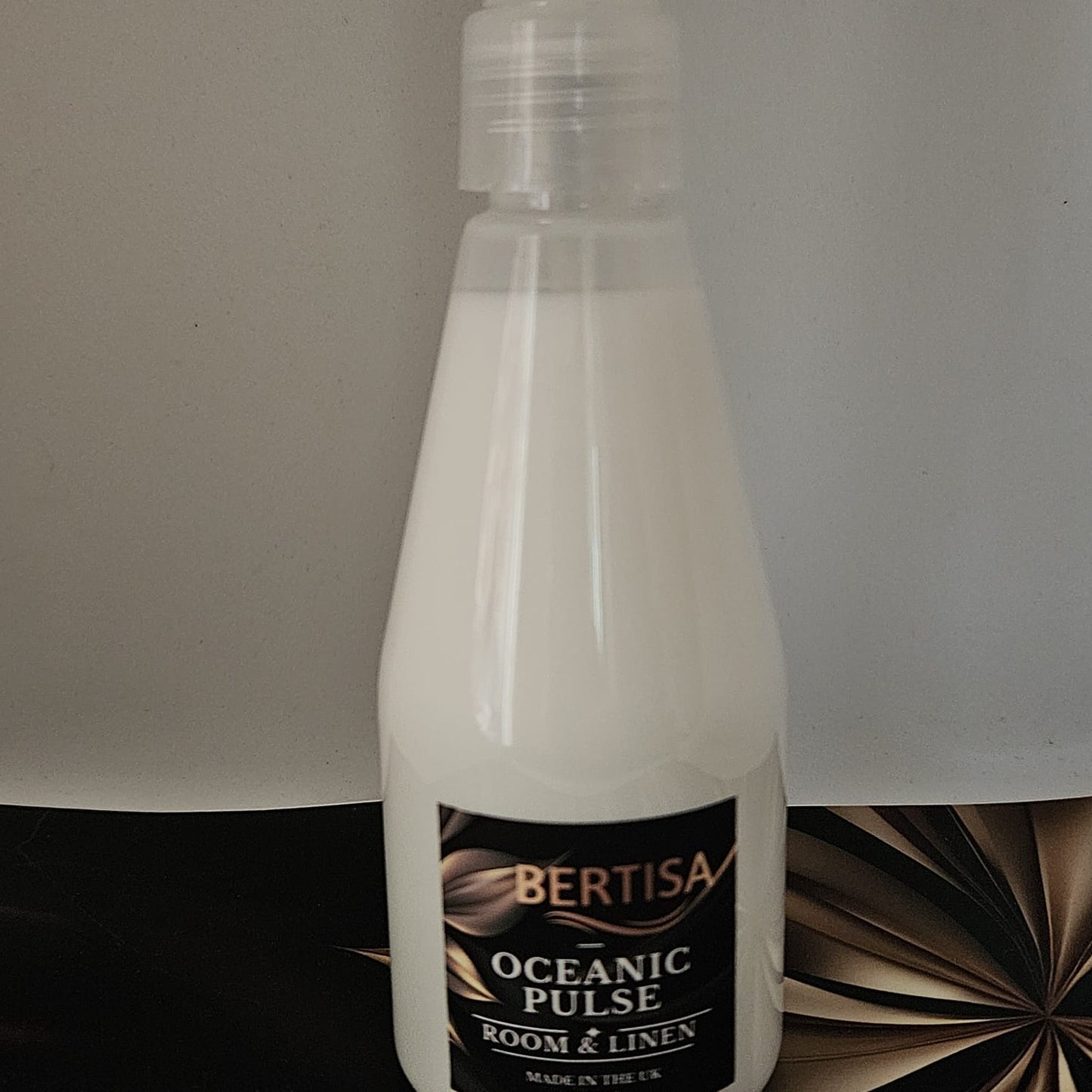 Bottle of Bertisa Oceanic Pulse room & linen spray on a neutral background