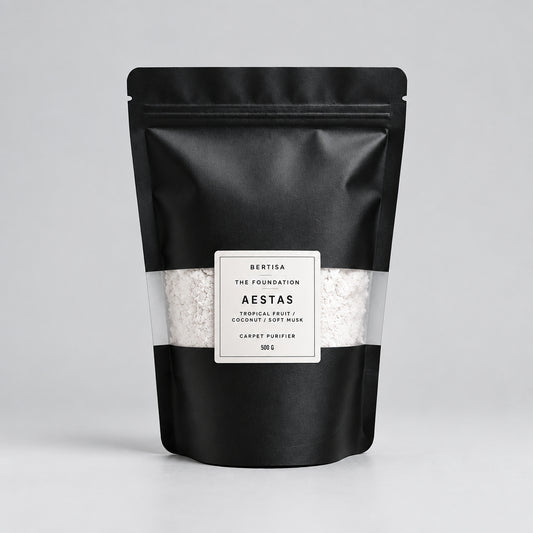 A matte black stand-up pouch of Bertisa The Foundation Aestas Carpet Powder, 500g, shown on a light gray background with a white label in the center.