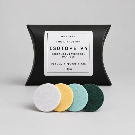 Diffusion discs packaging with lavender flowers on a dark surface