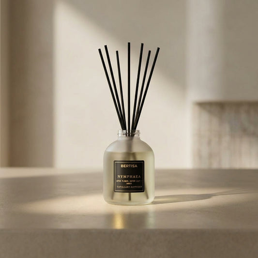Diffuser with black sticks on a neutral background