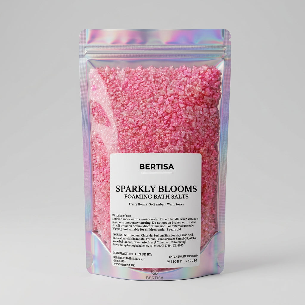 Foaming bath salts pouch with pink sparkling granules and floral-fruity label