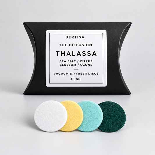 Pack of Bertisa Thalassa vacuum diffuser discs on a concrete surface