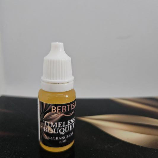 Bottle of Bertisa Timeless Bouquet fragrance oil on a dark surface with a blurred background